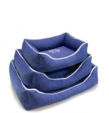 Cama cuadrada azul con huella y ribete 55x46x17 cm.